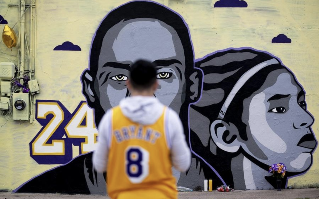 Kobe and Gigi Tribute mural with guy in Lakers Jersey, in Austin TX